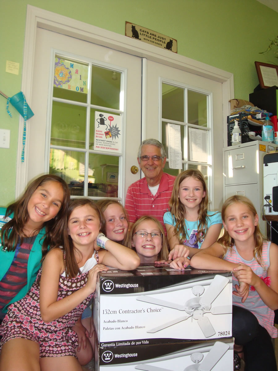 Girl Scouts Becky Hodges, Ashley Voeltz, Emily Van Orden, Savanna Slocum, Shannon McDaniel and Emma Spaeth (left to right) deliver two new ceiling fans to the West Columbia Gorge Humane Society's cat building.