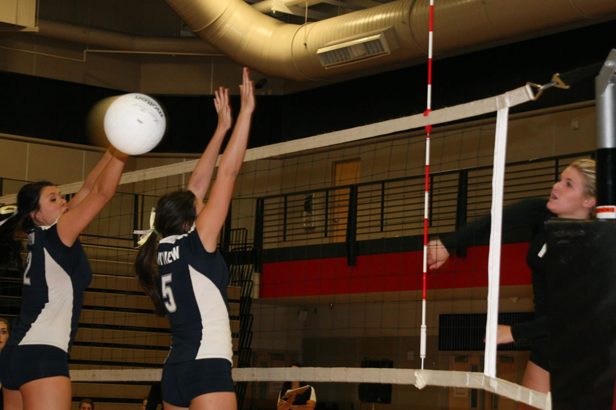 The volleyball comes off the fist of Brindl Langley like a speeding bullet.