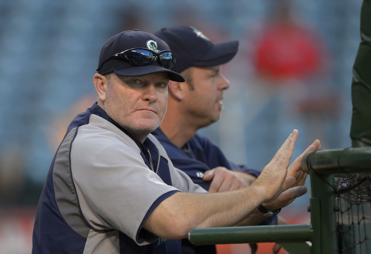 Seattle Mariners manager Eric Wedge looks on prior to their baseball game against the Los Angeles Angels, Tuesday, Sept. 25, 2012, in Anaheim, Calif.  (AP Photo/Mark J.