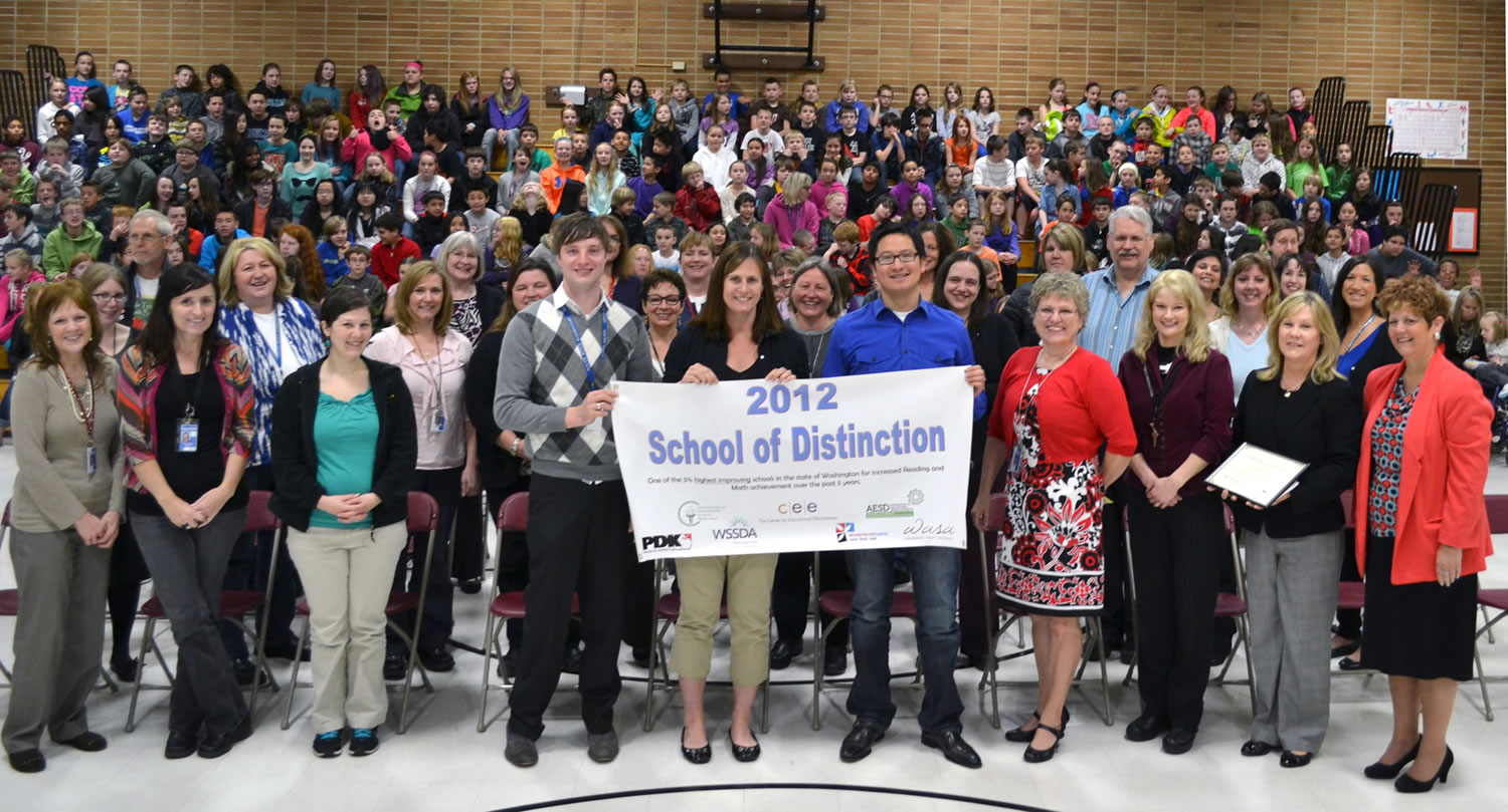 Ridgefield: Staff and students of South Ridge Elementary School celebrate being labeled a &quot;2012 School of Distinction&quot; at an assembly April 10.