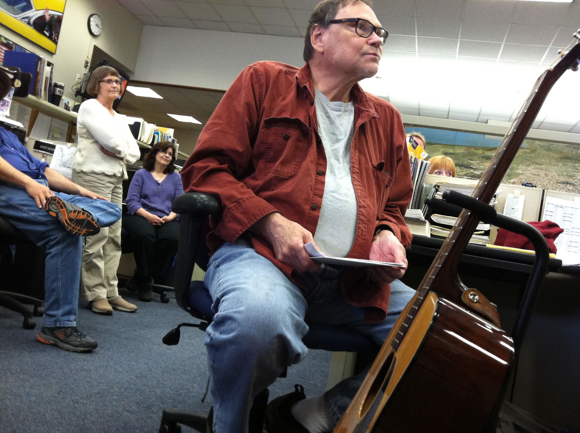 John Branton listens to tributes at a celebration of his career last year at The Columbian.