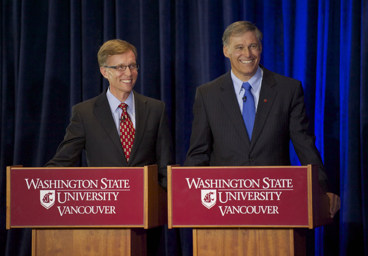 Rob McKenna, left, and Jay Inslee, candidates for Governor of Washington State, debate at the WSUV campus in Vancouver, Wa, Wednesday, August 29, 2012.