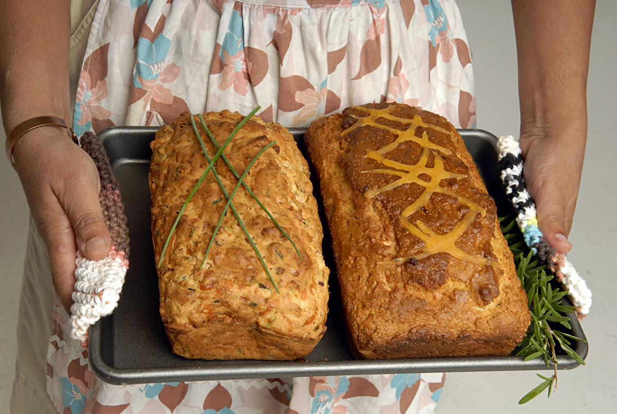Quick breads -- Iozza's Corn and Bacon Loaf, left, and Praline-Apple Bread -- are just what the name implies: Mix, bake, take and share relying on baking soda or baking powder for rise instead of waiting for yeast.