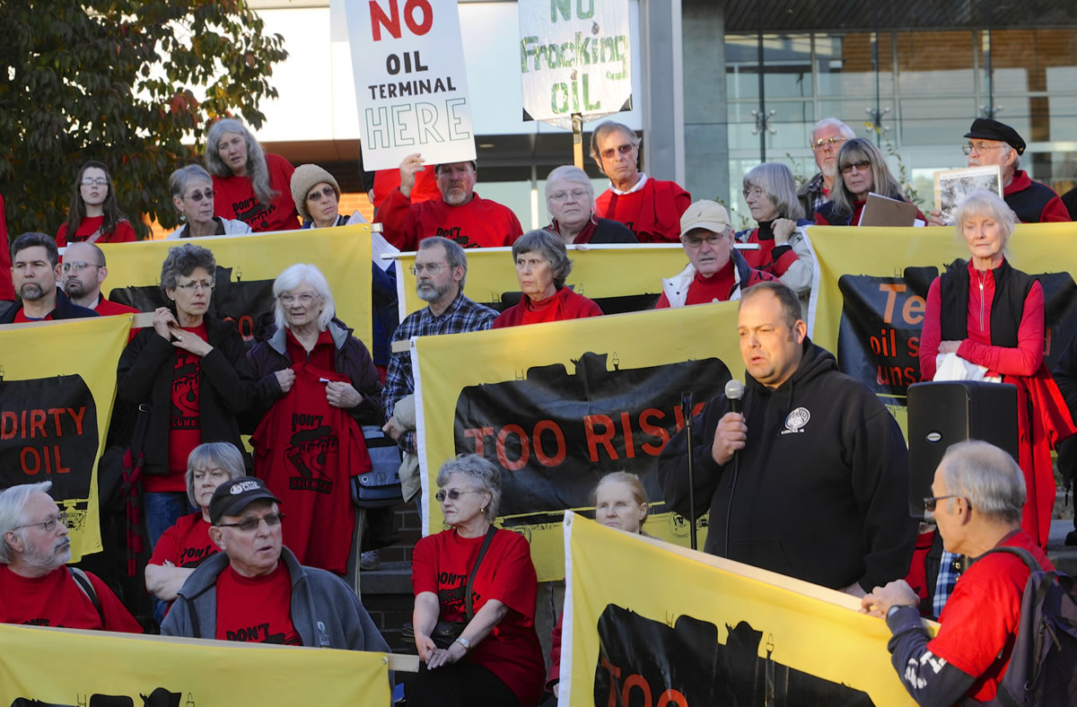Cager Clabaugh, president of the International Longshore and Warehouse Union Local 4, speaks Tuesday during a rally against a proposed oil terminal in Vancouver.