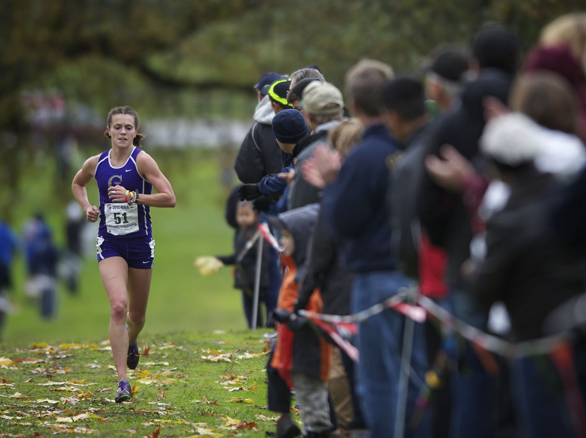 Hillary Holt, from the College of Idaho, wins the NAIA cross country national championship race at Fort Vancouver on Saturday, November 17, 2012.