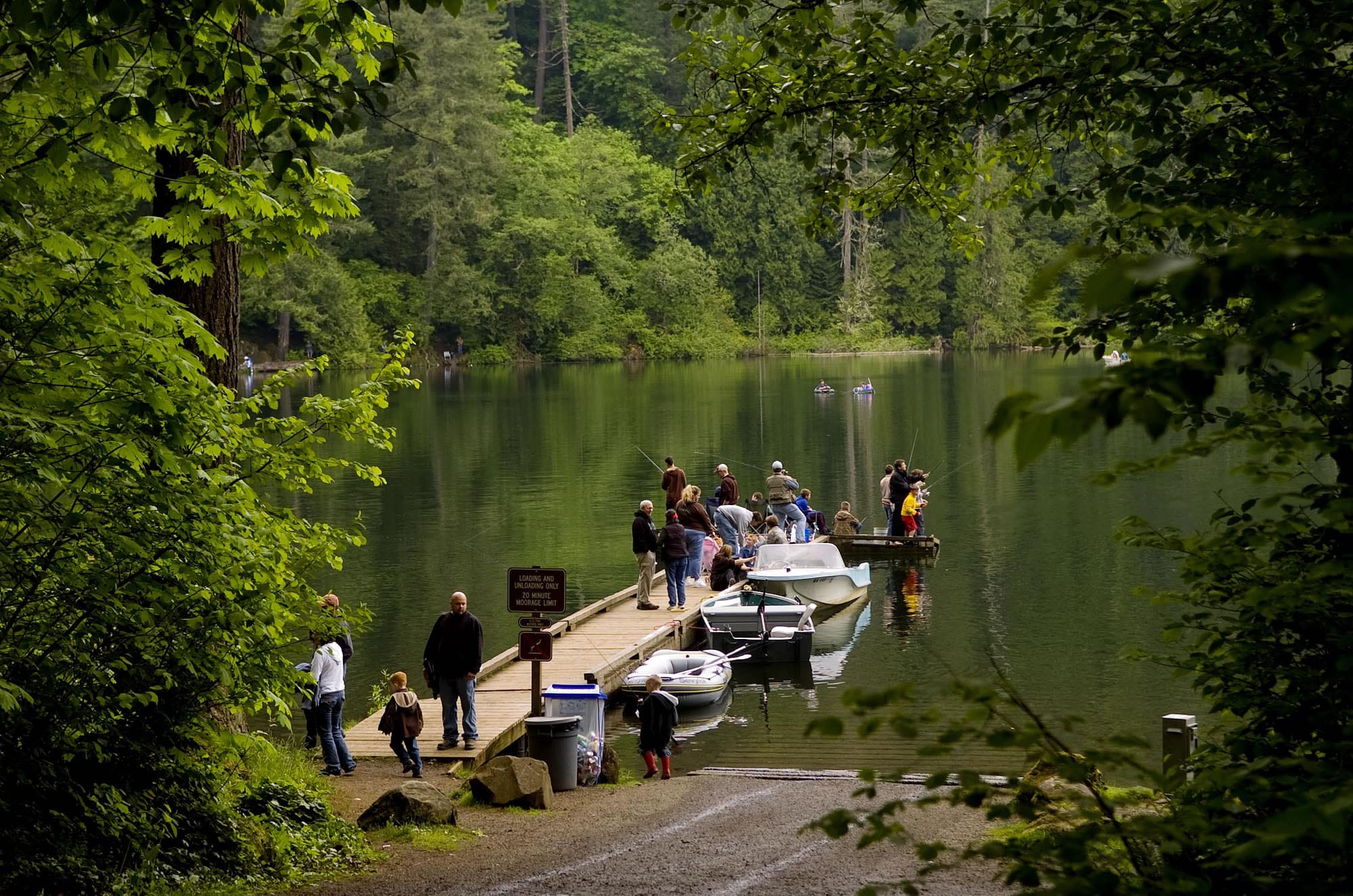 People enjoy a sunny day at Battle Ground Lake State Park.