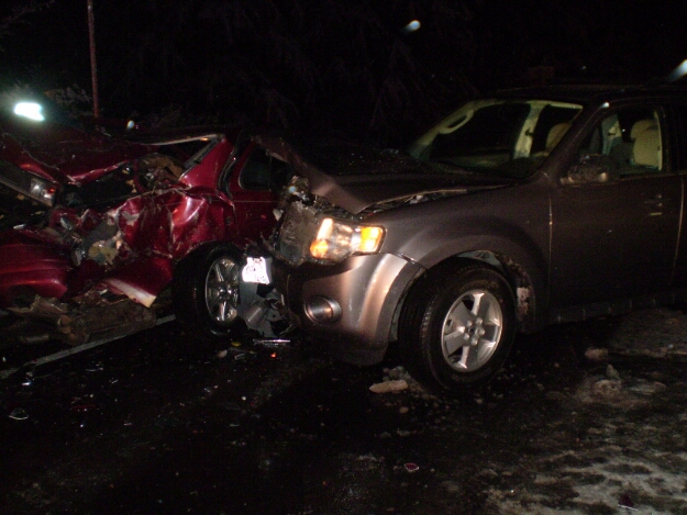 Four people were injured Wednesday when two vehicles collided on a slick Highway 26 near Frog Lake, Ore.