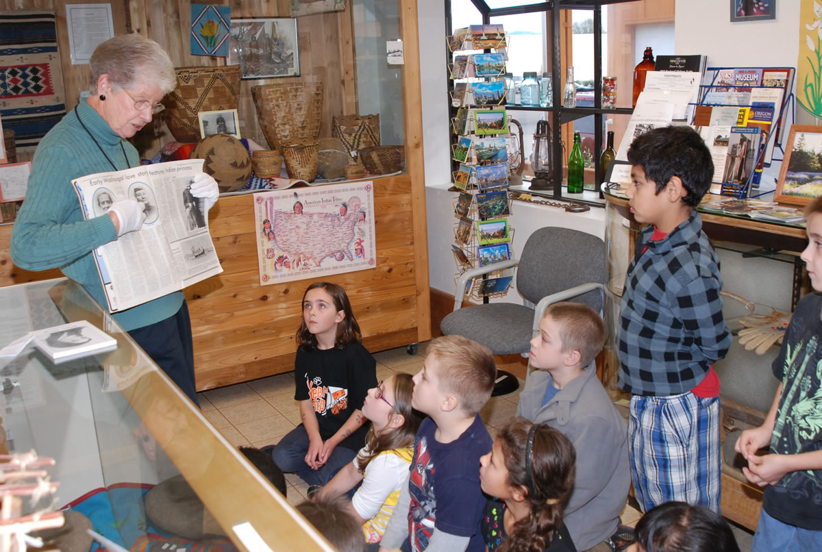 The Two Rivers Heritage Museum volunteer Carol Phillips reads the story of Princess White Wing to second-graders from Hathaway Elementary School.
