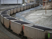 A coal train is heading north through the old Georgia-Pacific site in Bellingham, Washington, March 1, 2011.