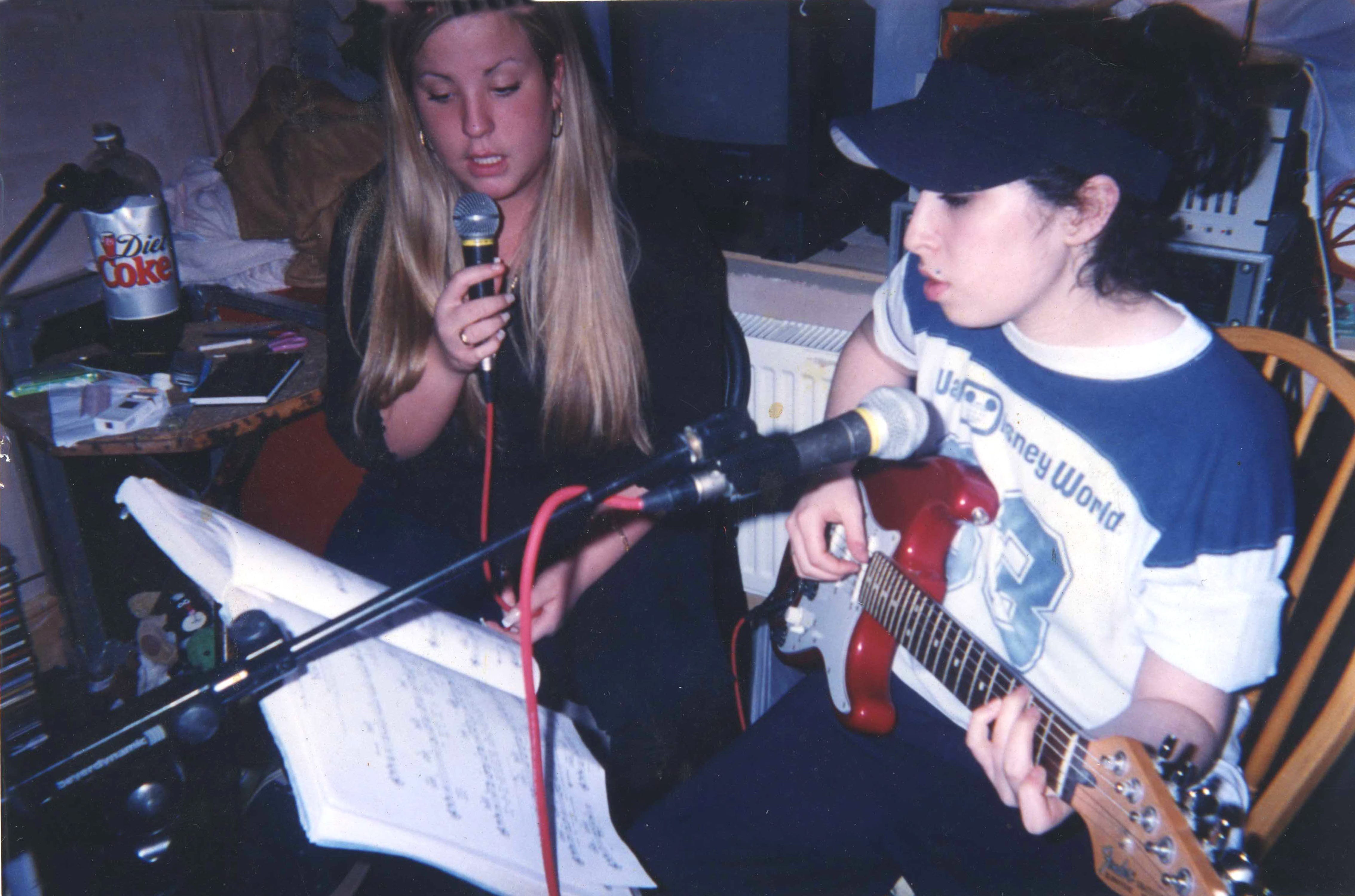 Singer Amy Winehouse, right, works on a song in the documentary film &quot;Amy.&quot; (A24 Films)
