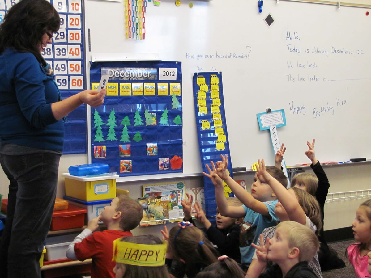 Grass Valley Elementary School kindergarten teacher Ellen Keller and her students participate in an interactive math lesson.