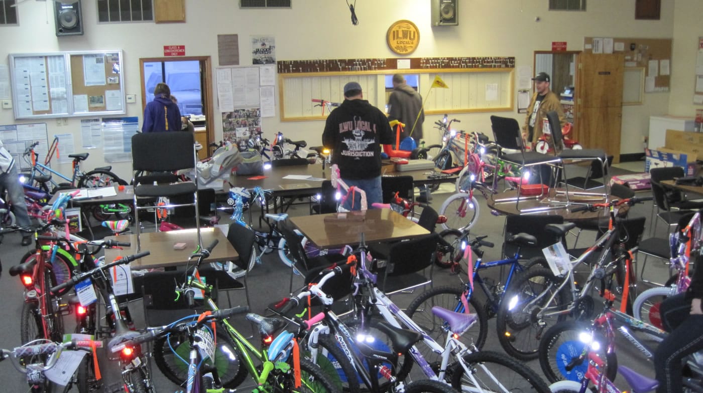The International Longshore Workers Union Local 4 collects new bikes to give to needy children for the holidays.
