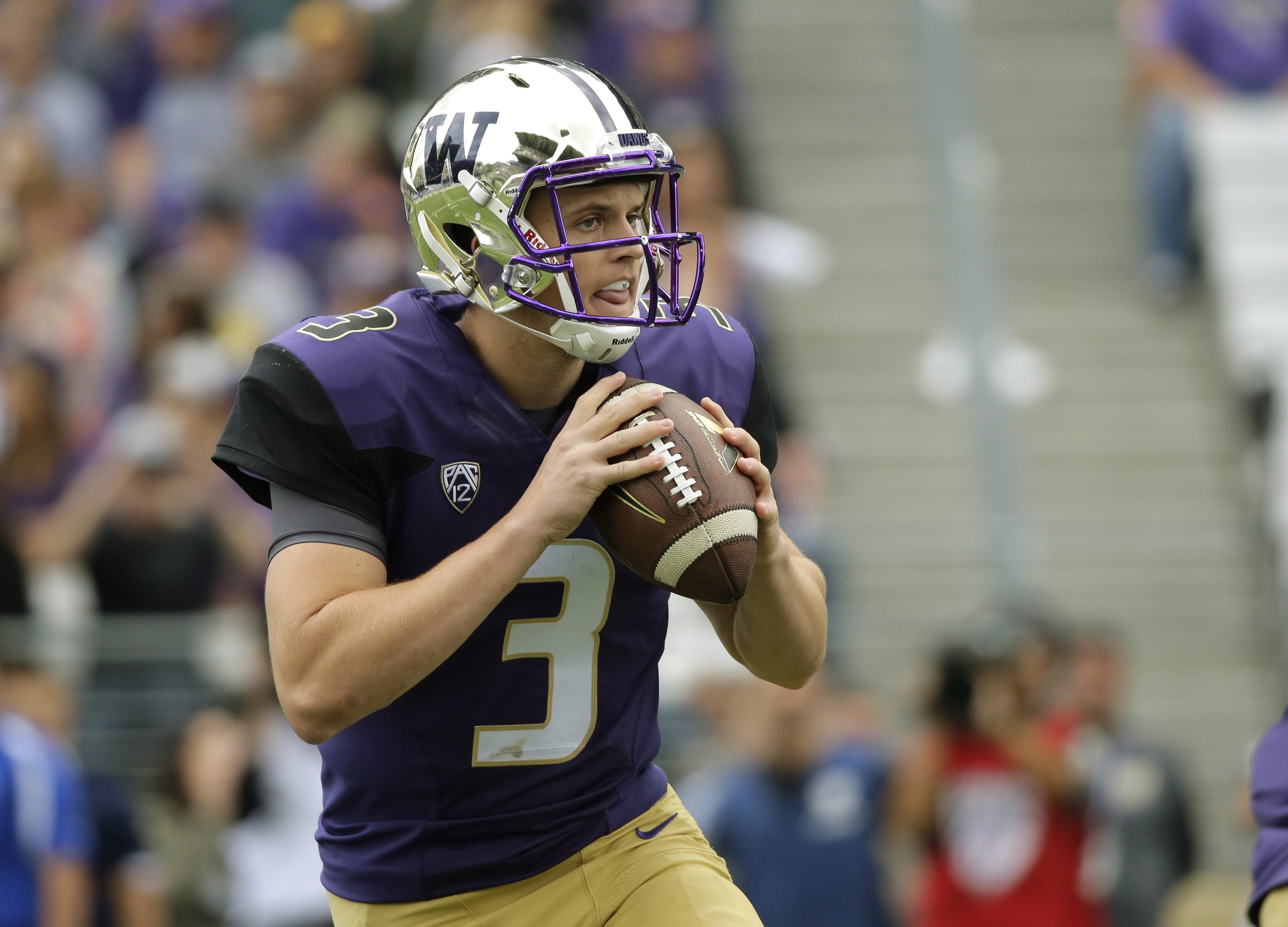 Washington quarterback Jake Browning drops to pass against Utah State in the first half of an NCAA college football game, Saturday, Sept. 19, 2015, in Seattle. (AP Photo/Ted S.