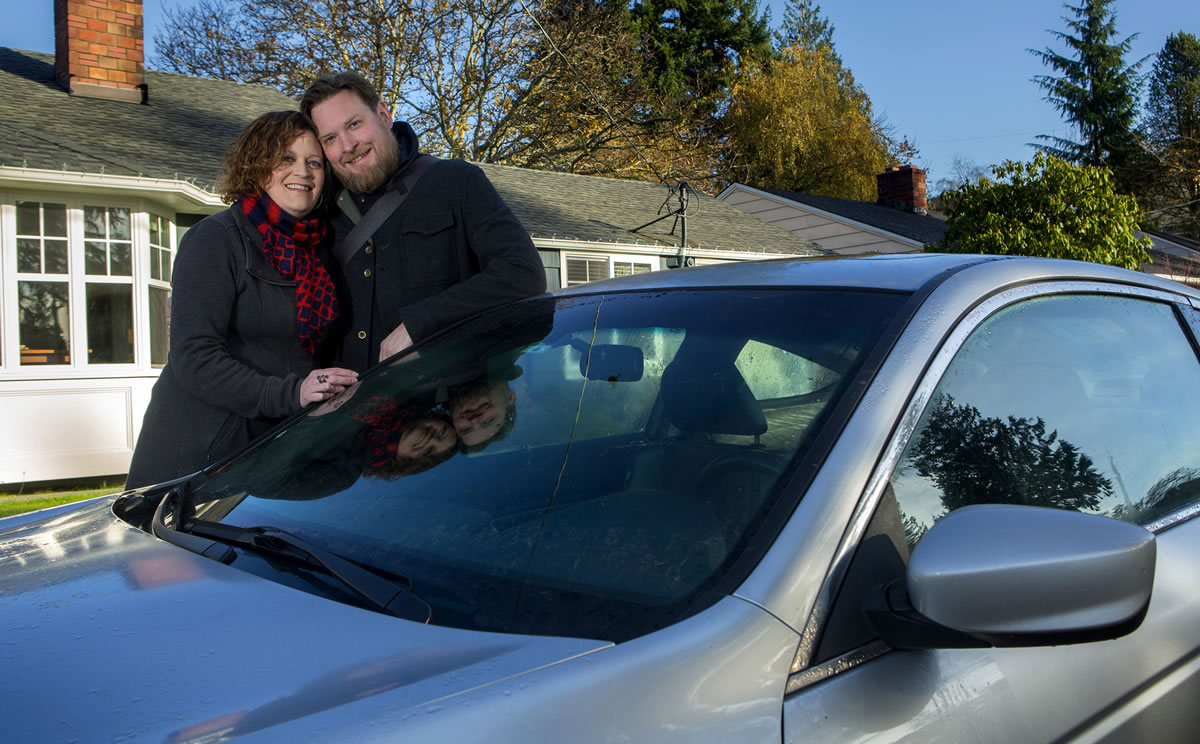 Amy and Roy King of West Seattle rent their car out to strangers through Turo, a peer-to-peer car-sharing service. Roy King takes a Microsoft shuttle to work, skips the tolls, and tallies extra steps on his Fitbit. (Ellen M.