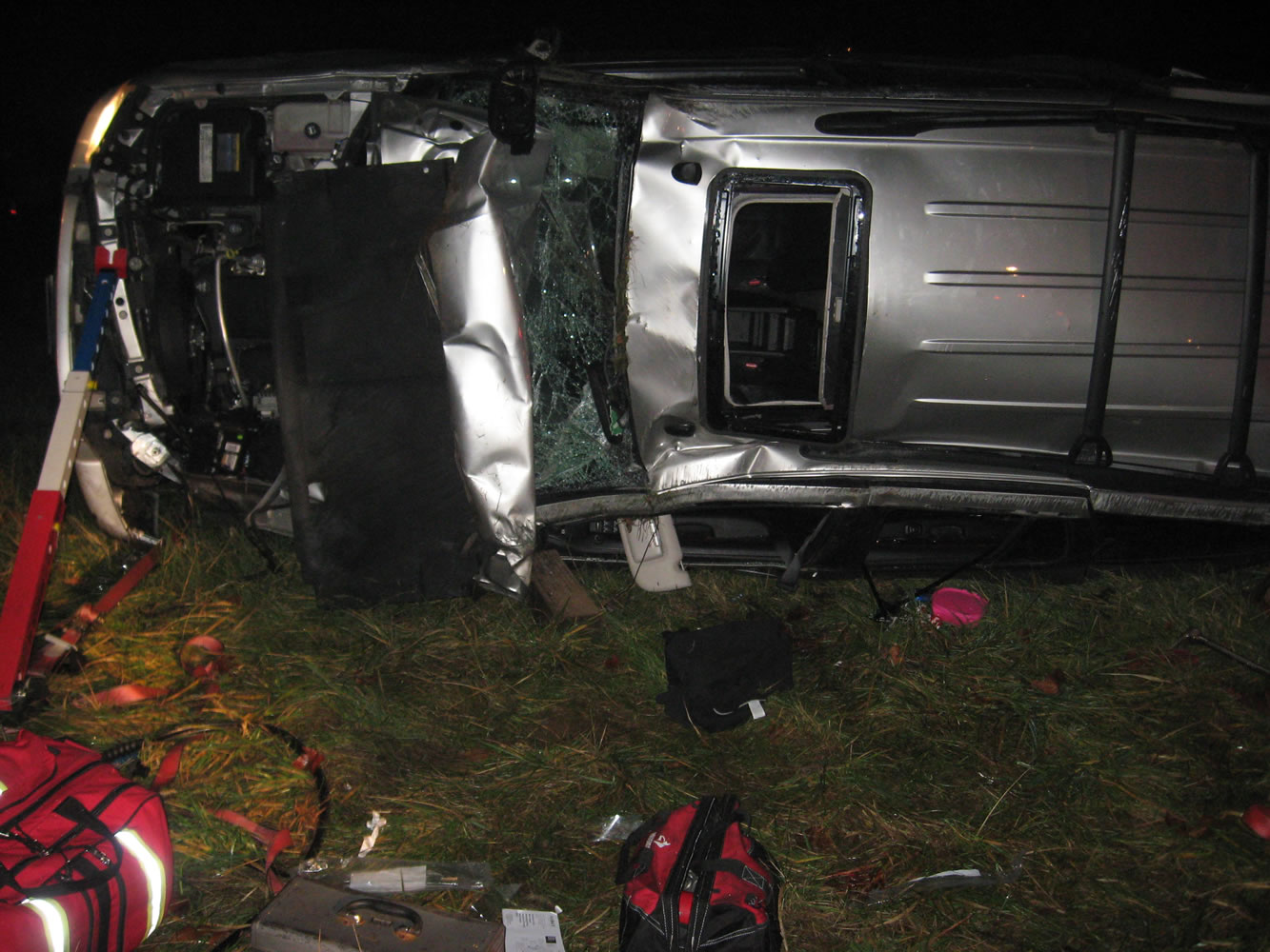 Photo by Fire District 3 Chief Steve Wrightson 
Friday night this GMC SUV was southbound on Northeast Caples Road when it rolled several times off the road into a field. The driver, who was extricated by firefighters from the SUV, was transported to an area hospital.