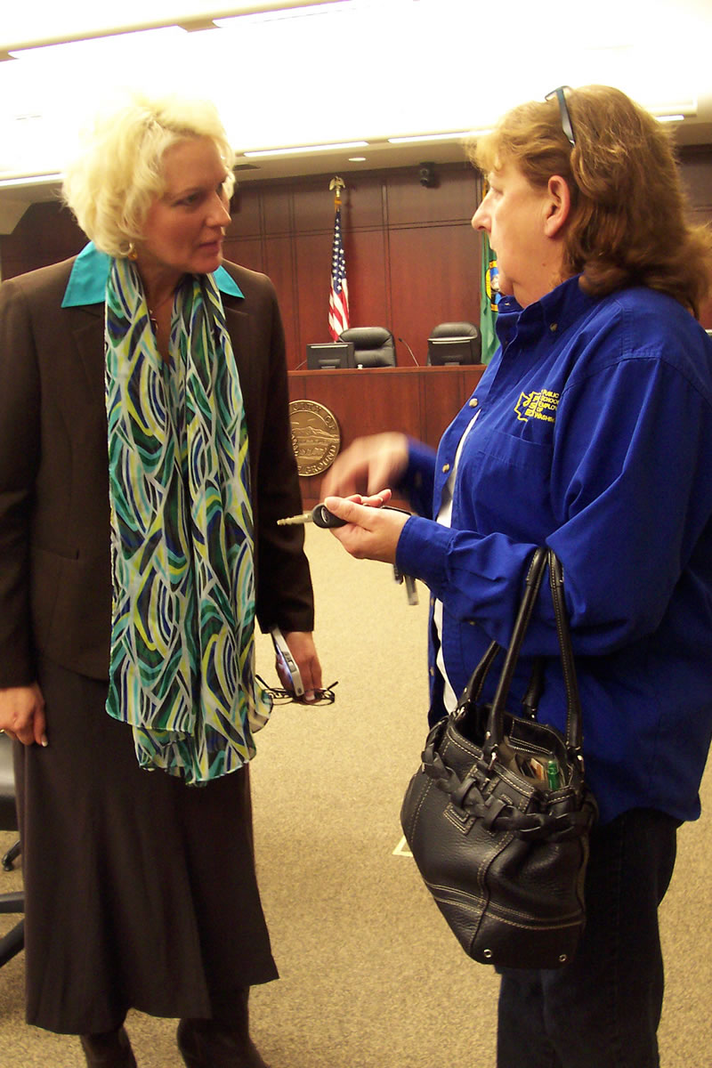 Battle Ground: Newly elected state Rep. Liz Pike, R-Camas, speaks with one of nearly 50 constituents who attended a legislative town hall meeting Jan. 5 at Battle Ground City Hall. Pike and state Sen.