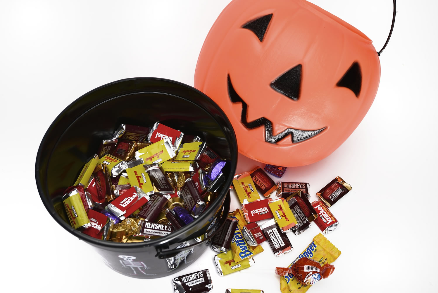 Kids may collect miniature candies while trick-or-treating, but local dietitians and pediatricians warn the calories in those smaller versions can quickly add up.