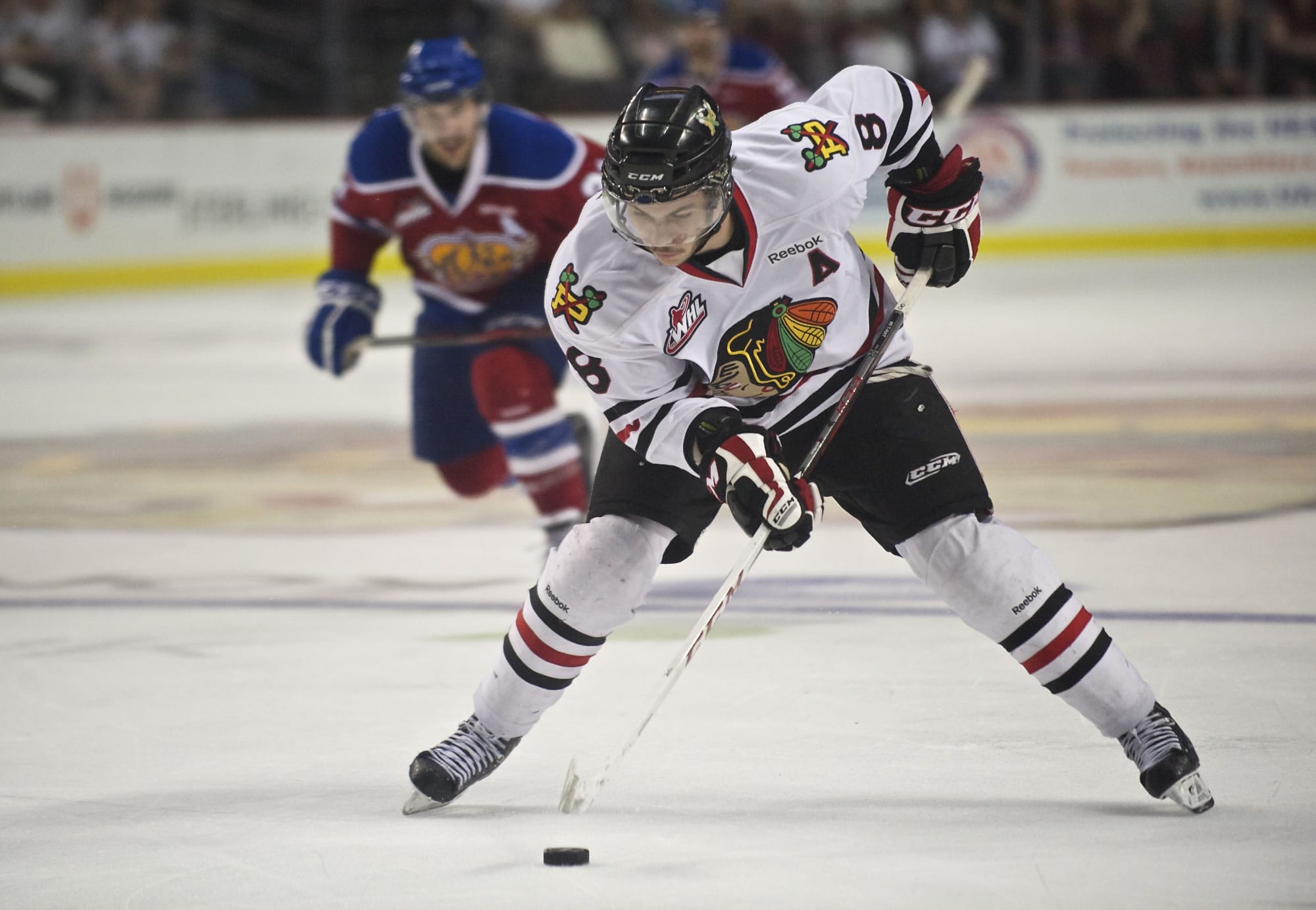 The Winterhawks' Ty Rattie carries the puck into the offensive zone in the second period against the Oil Kings at the Rose Garden. The Winterhawks fell 3-2 in overtime.