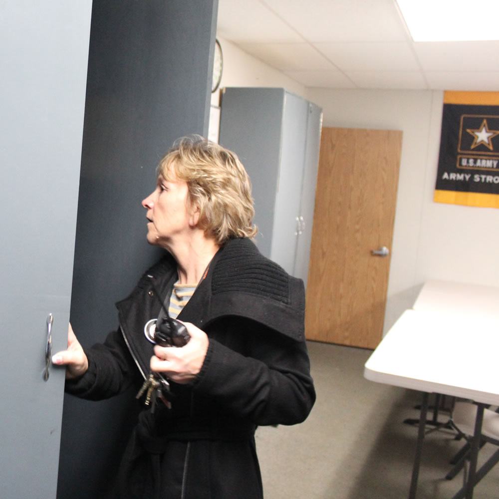 Assistant principal Sue Fine searches the school with others after the bomb threat that morning.