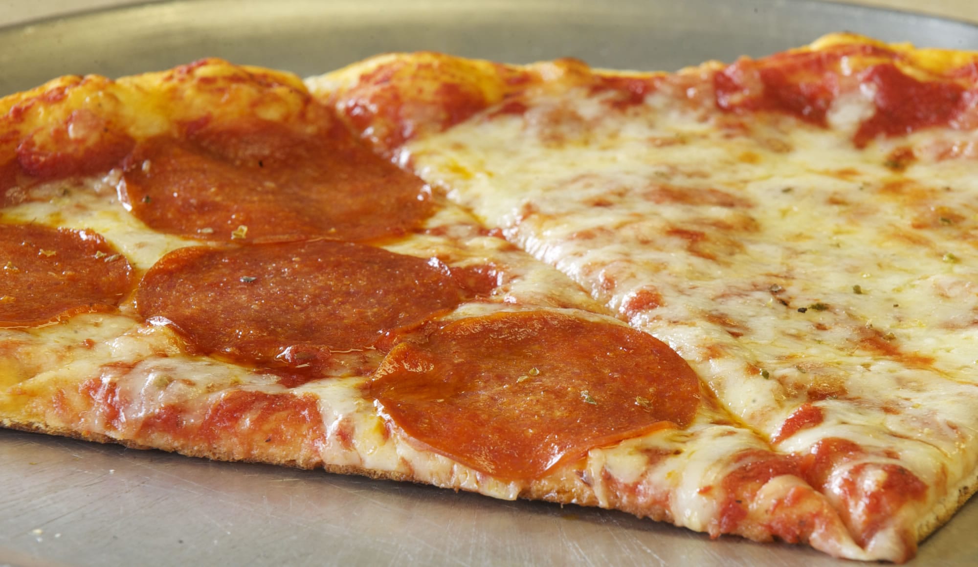 Pepperoni and cheese pizza is a favorite at NYC Pizzeria on Chkalov Drive in Vancouver.