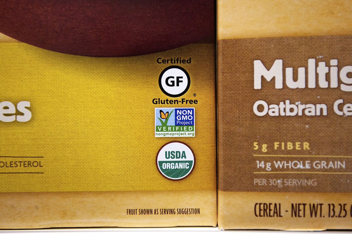 A label advises customers at New Seasons Market in Vancouver about GMO products.
