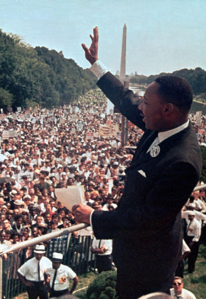 The Rev. Martin Luther King Jr. waves to the crowd at the Lincoln Memorial for his &quot;I Have a Dream&quot; speech during the March on Washington on Aug.