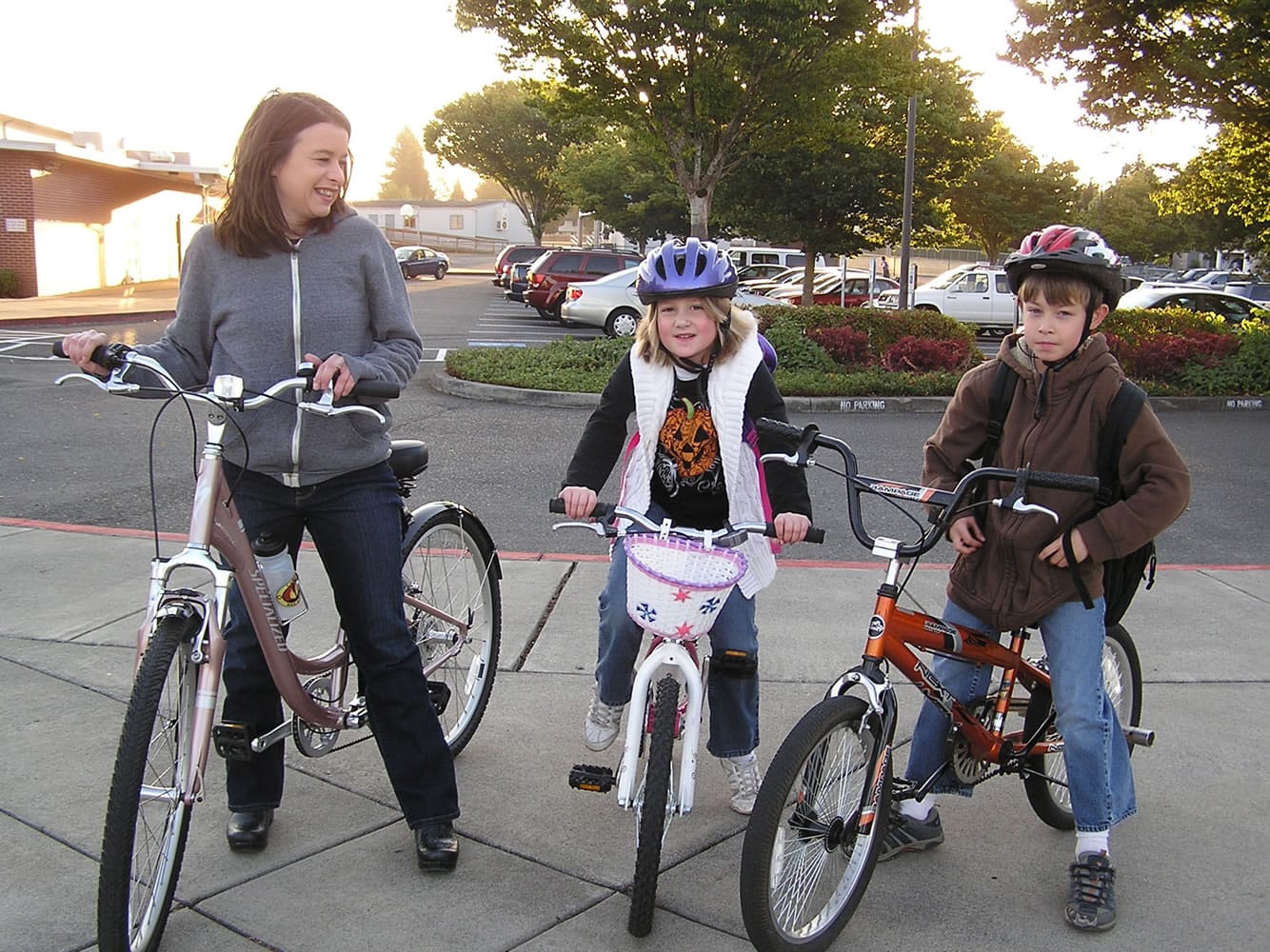 Walnut Grove: Michealle Gregory, left, and her children, Chloe and Jacob Gregory, rode their bikes to Walnut Grove Elementary School on International Walk to School Day on Oct.