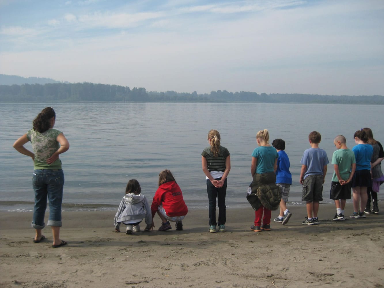 Washougal: Renee O'Neil, Columbia Springs education coordinator, leads fourth-grade students in an exploration of the Columbia River ecosystem at Cottonwood Beach during the Student Watershed Festival on Sept.