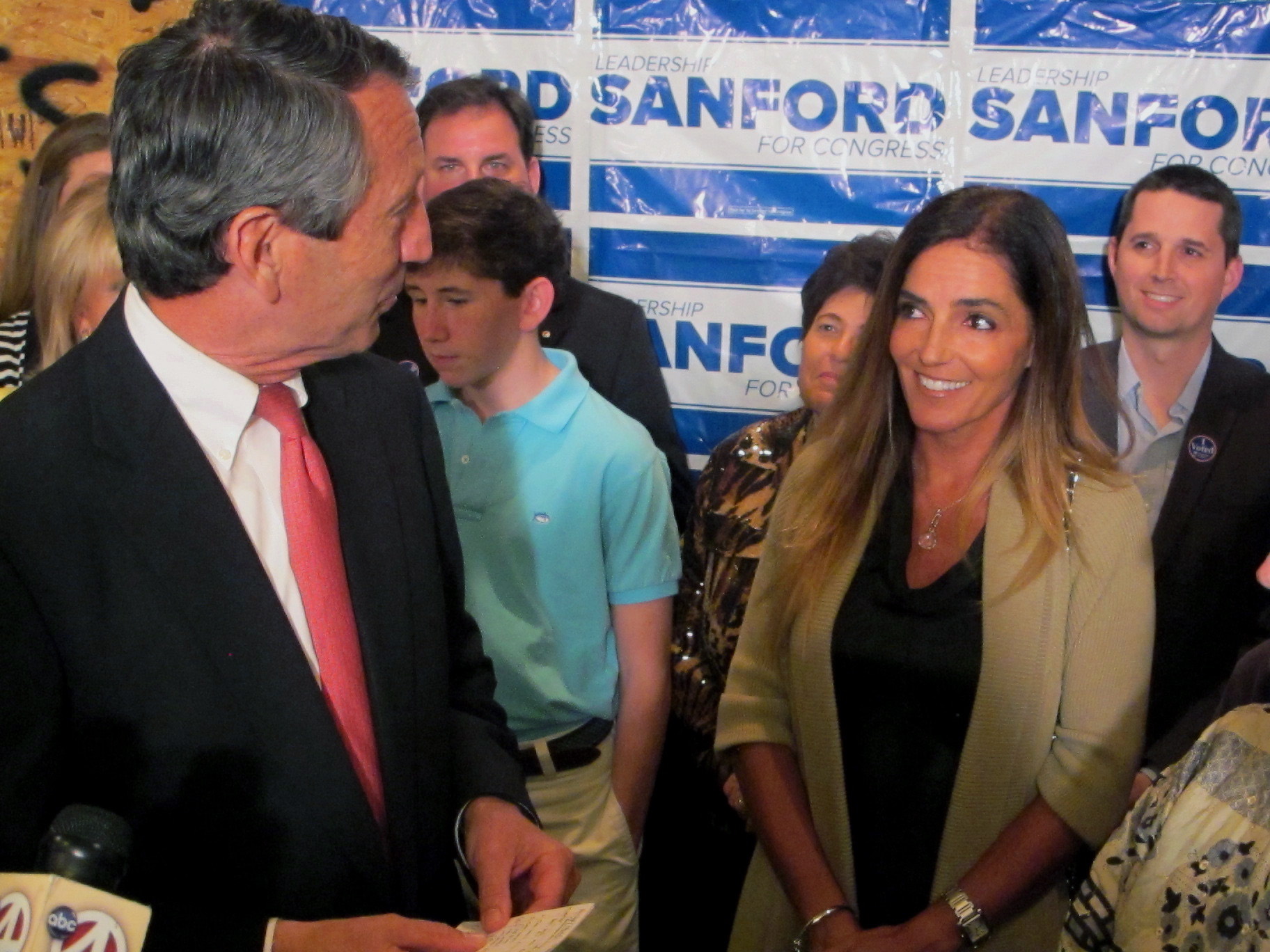 Former South Carolina Gov. Mark Sanford thanks his fiance, Maria Belen Chapur, as he addresses supporters in Mount Pleasant, S.C., on Tuesday, after winning the GOP nomination for the U.S.