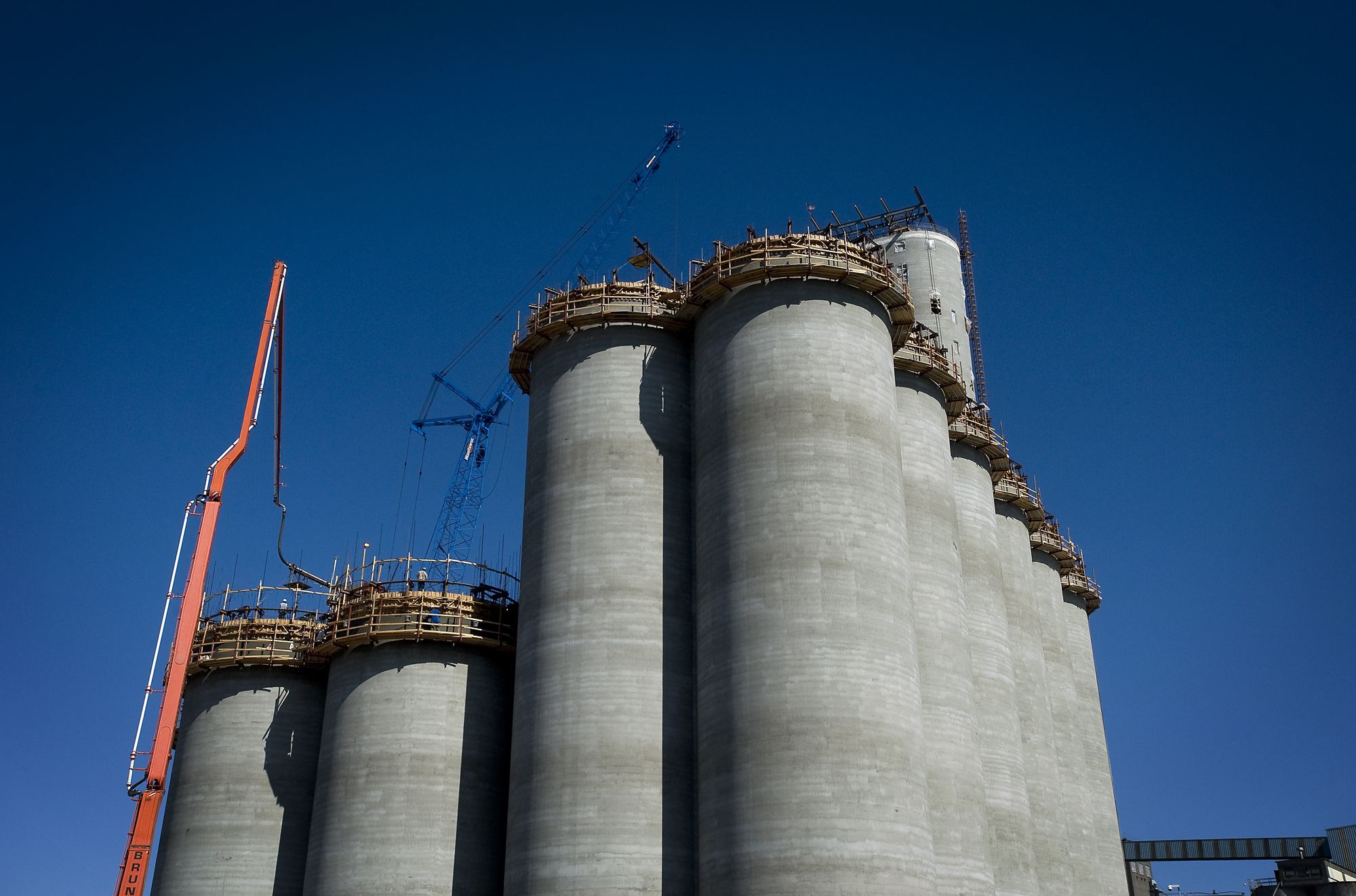 Construction continues on a cluster of silos at United Grain Corp.
