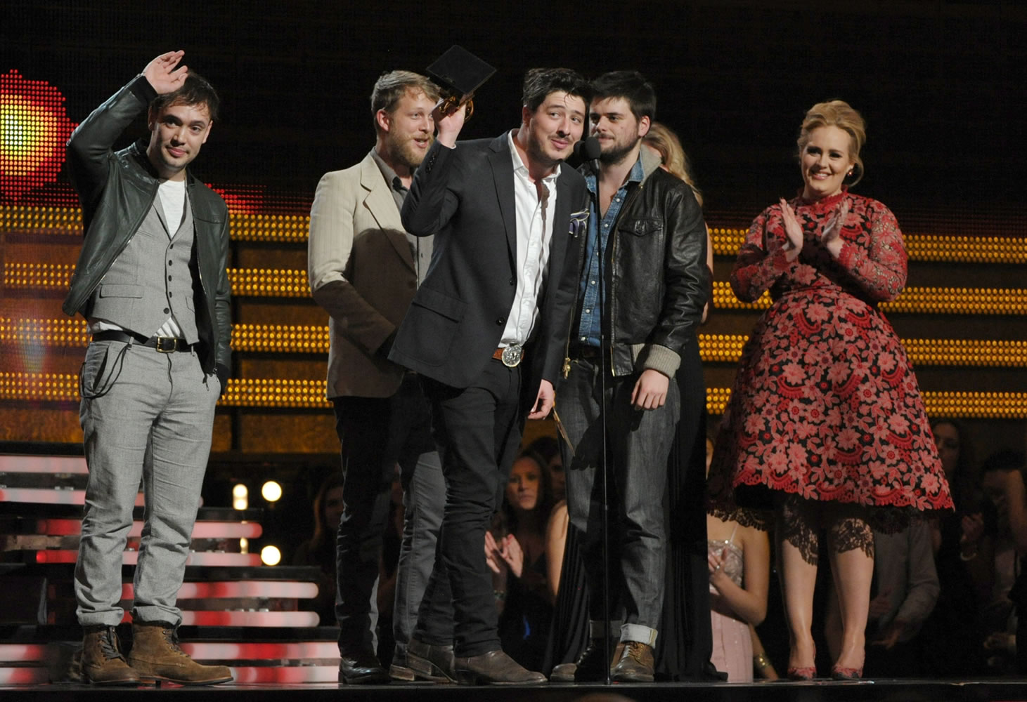 Mumford &amp; Sons, from left, Ben Lovett, Ted Dwayne, Marcus Mumford and Country Winston Marshall accept the award for album of the year for &quot;Babel&quot; at the 55th annual Grammy Awards on Sunday in Los Angeles.