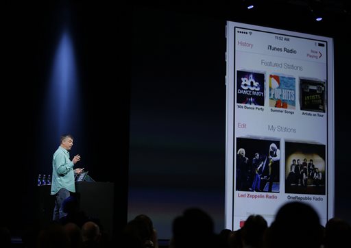 Eddy Cue, the Apple senior vice president of Internet Software and Services, demonstrates the new iTunes Radio during the keynote address of the Apple Worldwide Developers Conference on Monday.