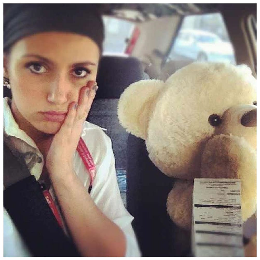 Scarlett Zibritovsky got slammed with a $260 traffic ticket for driving in an HOV lane with a oversized teddy bear riding shotgun.
