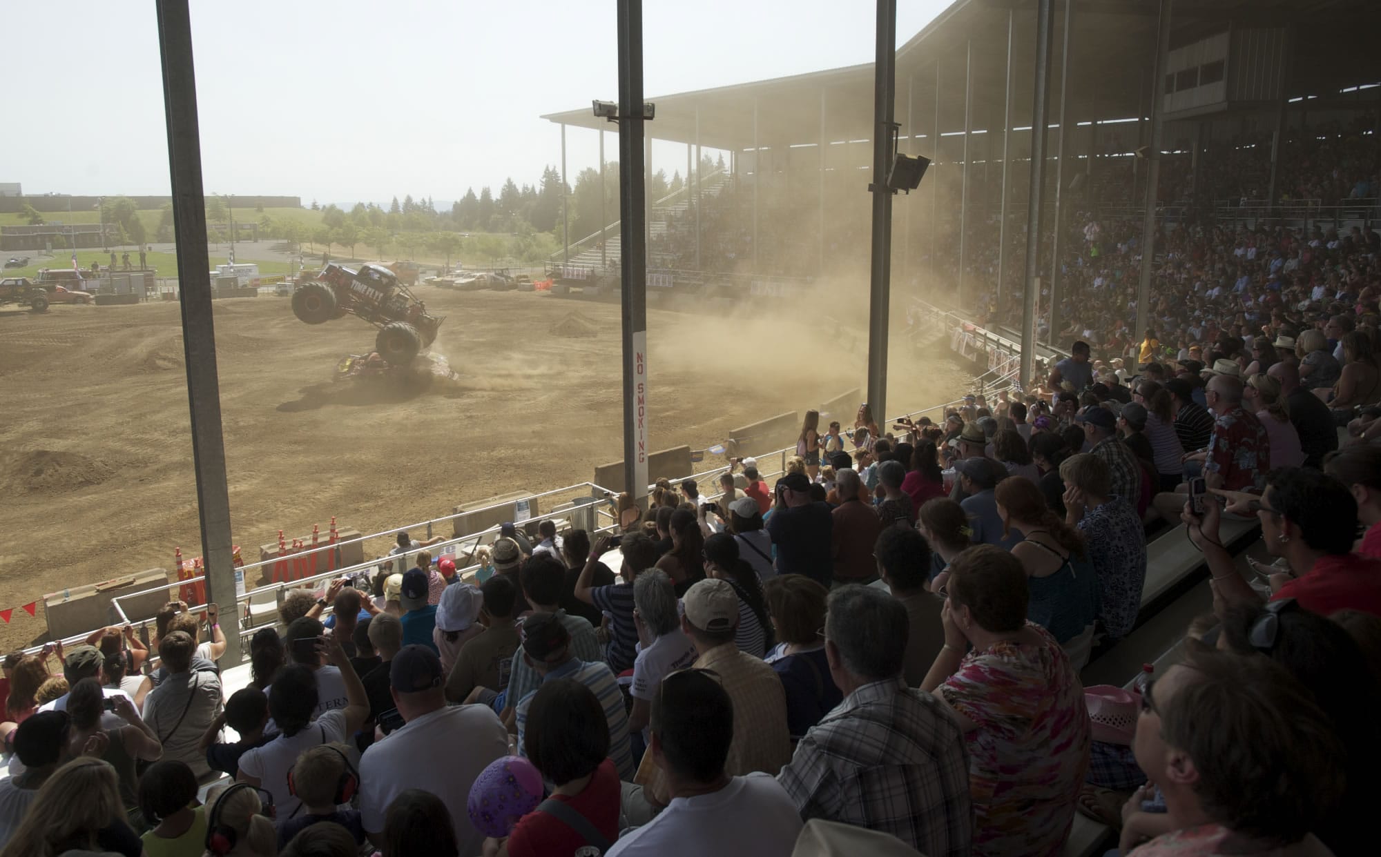 Drivers entertain a full house during the afternoon Monster Truck Show at the Clark County Fair on Saturday.