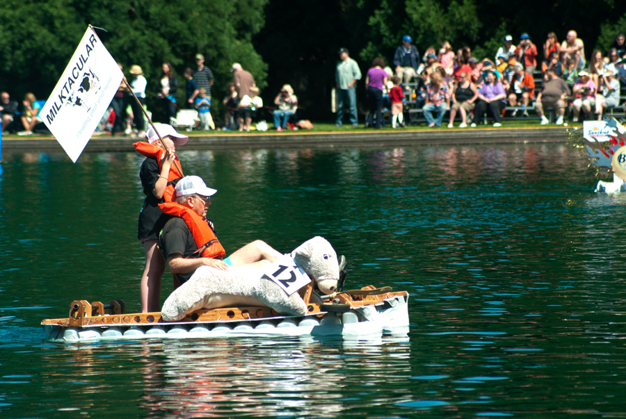Hazel Dell: Josiah Winiecki and his grandfather Tad paddle in a vessel fashioned from milk cartons at the annual Dairy Farmers of Oregon Milk Carton Boat Race held June 9 at Westmoreland Park in Portland.