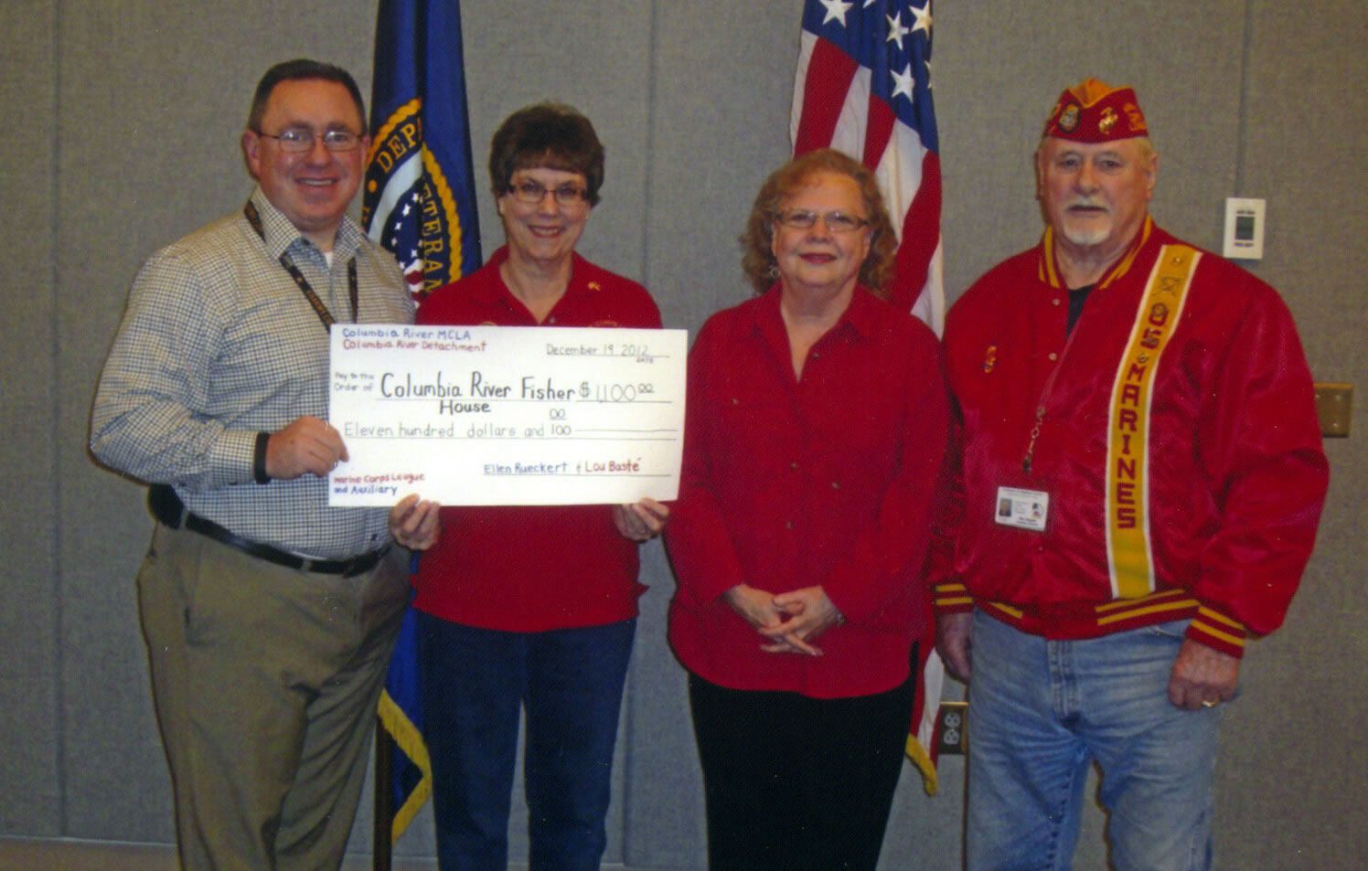 Central Park: Shaun Benson, from left, chief of voluntary service at the Portland Veterans Affairs Medical Center, accepts a Fisher House donation of $1,100 from Ellen Rueckert and Karen Baste' of the Columbia River Marine Corps League Auxiliary No. 398 and Rex Hopper of the Columbia River Marine Corps League Detachment No.