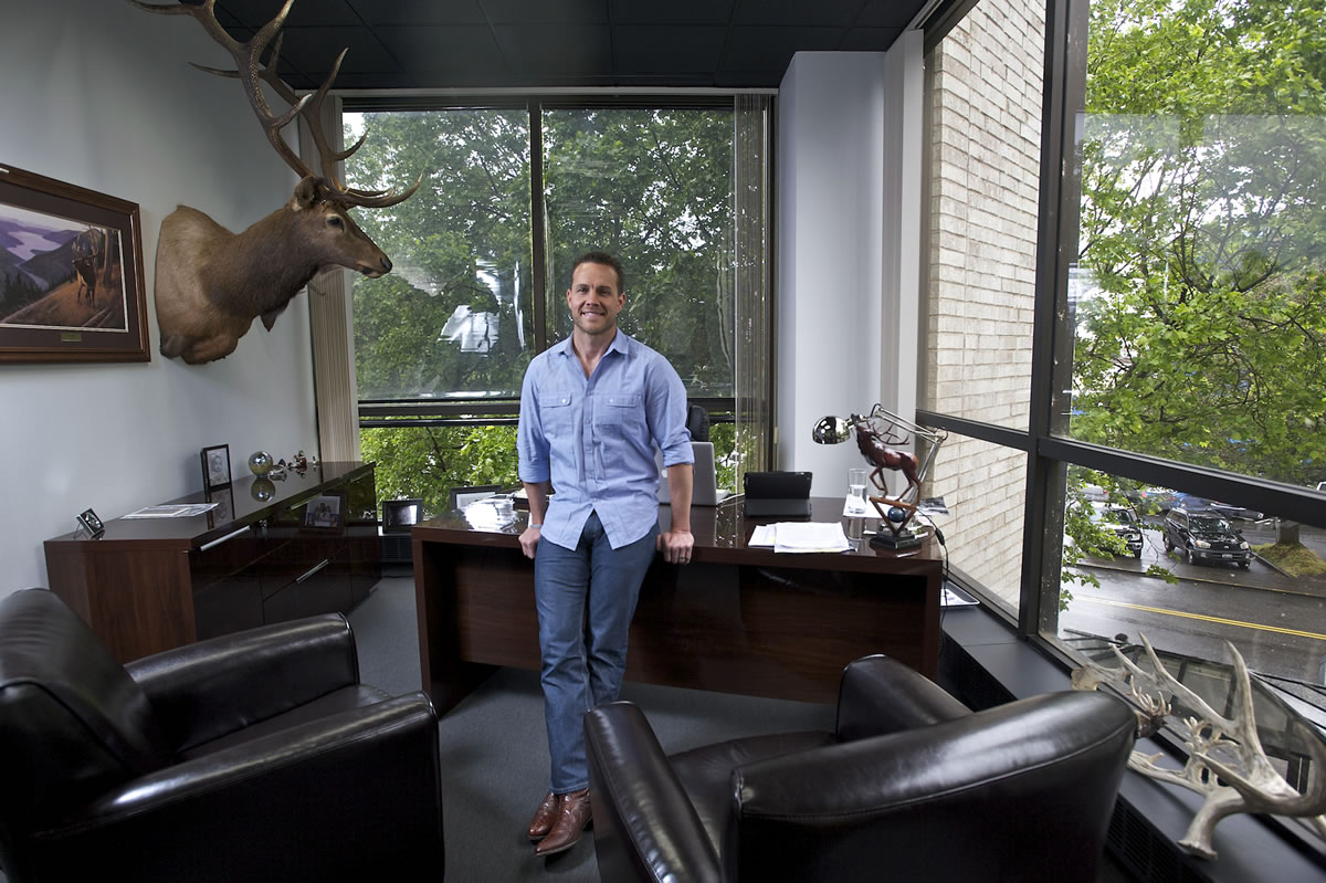 Ryan Hurley, president of Hurley Development, stands in his office inside the former Pacific Tower building, which he recently purchased for $3.2 million.