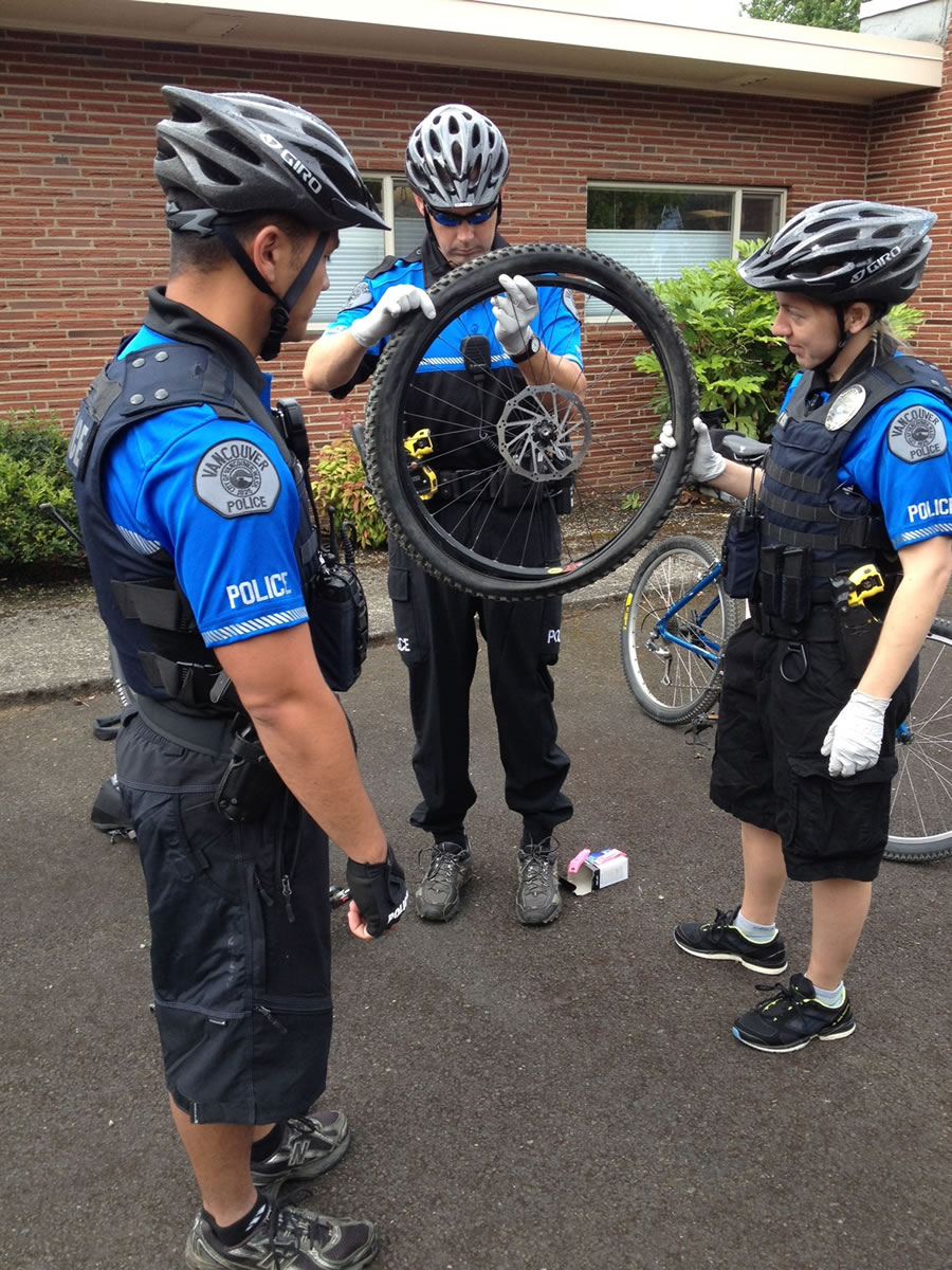 Hudson's Bay: Vancouver Police officers Jeremy Souza, from left, Rick Rich and Holly Musser take part in a bike patrol training course in early June.