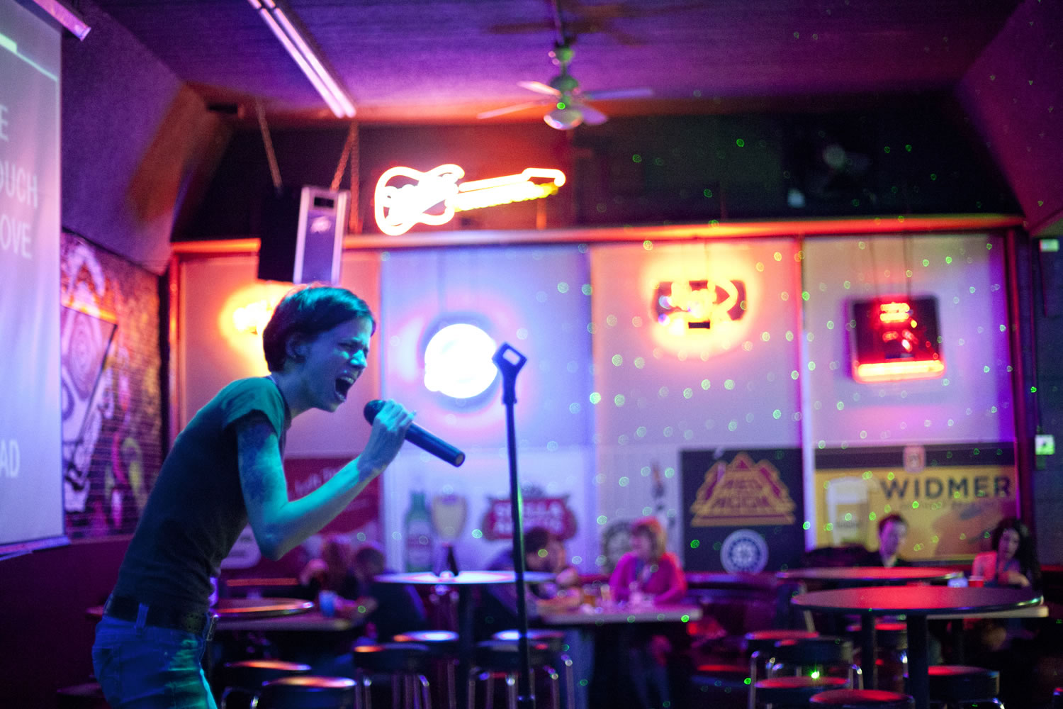 Gayle Tucker, 26, of Washougal belts out an Evanescence song and other heavy metal songs at BackAlley's Metal Monday karaoke night.