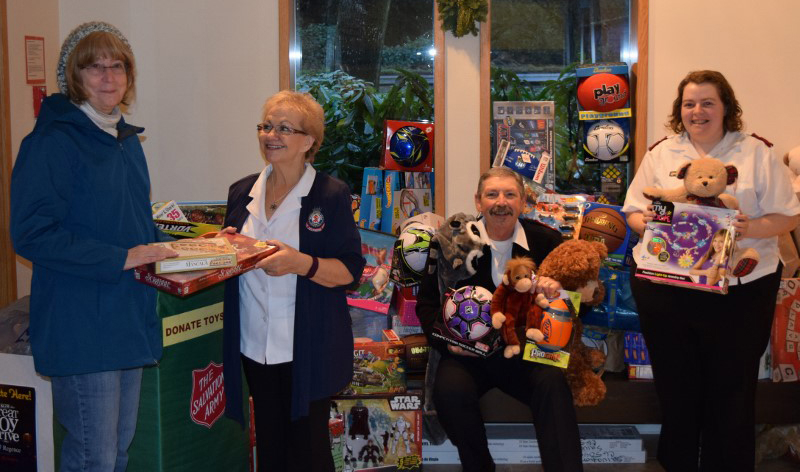 From left, Sharon Luft, Major Susan Nute, Major Michael Nute and Lt. Susan Cassin hold toys that the Salvation Army received after making a last-minute donation plea. Volunteers noticed they were running low on toys earlier this week.