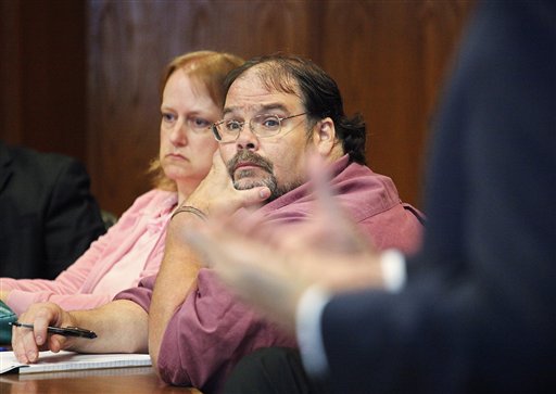 Jeffrey and Rebecca Trebilcock of Longview listen to the prosecuting attorney lay out his arguments against them for abuse of adopted children during a bench trial Monday in Cowlitz County Superior Court in Kelso.