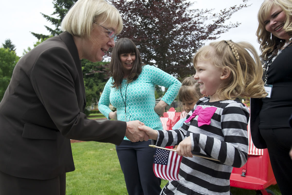Laney Fant, 5, a student at the Patricia Nierenberg Child Care and Early Learning Center, welcomes U.S. Sen. Patty Murray, D-Wash., to the center on Friday.