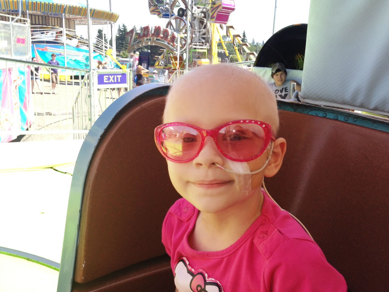 Jenasey Boyd, 5, enjoys a carnival ride at the Clark County Fair thanks to the Memory Makers program.