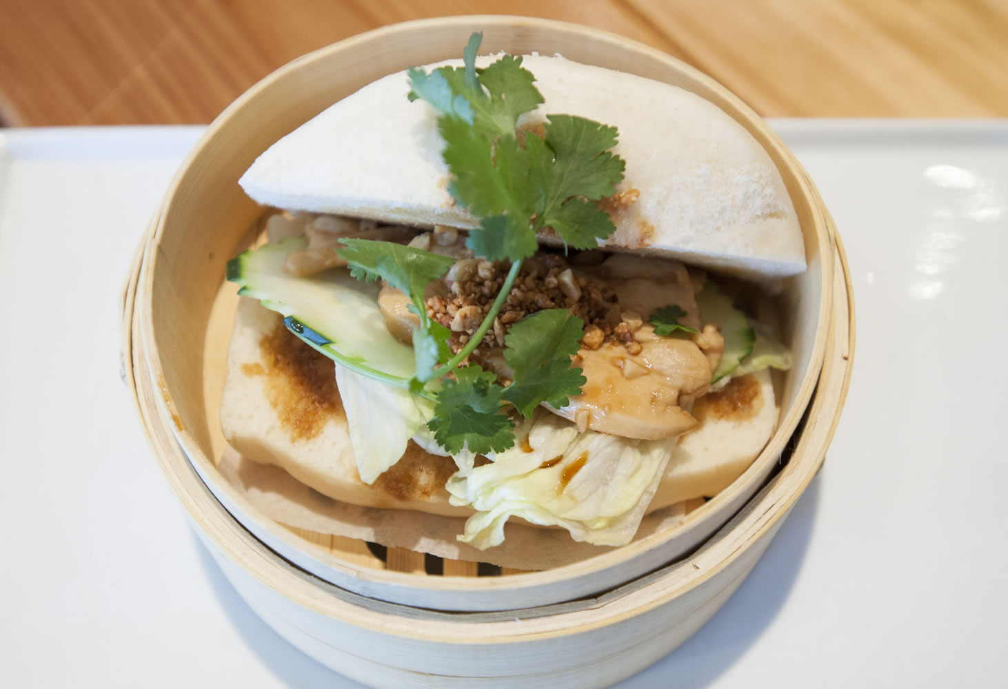 Bao bao, a steamed fluffy bun with grilled marinated chicken, veggies and peanut is served at the I am Thai Eatery in Vancouver.