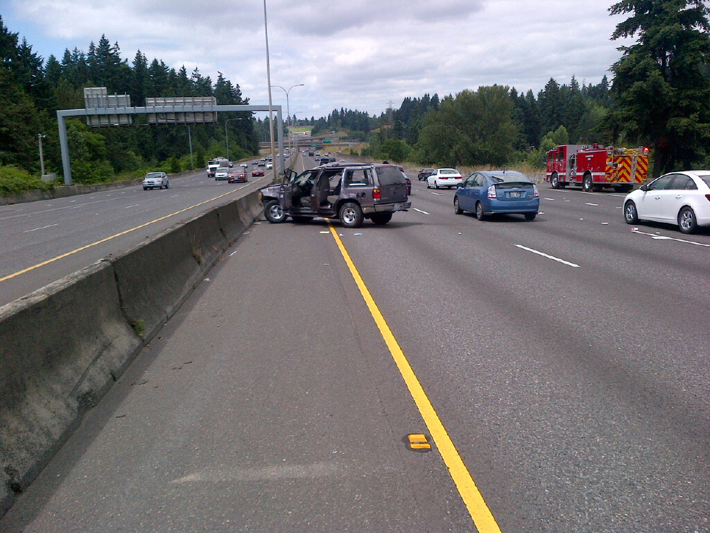 A 15-year-old boy crashed this Ford Explorer on I-5 and fled into Leverich Park with his two passengers.