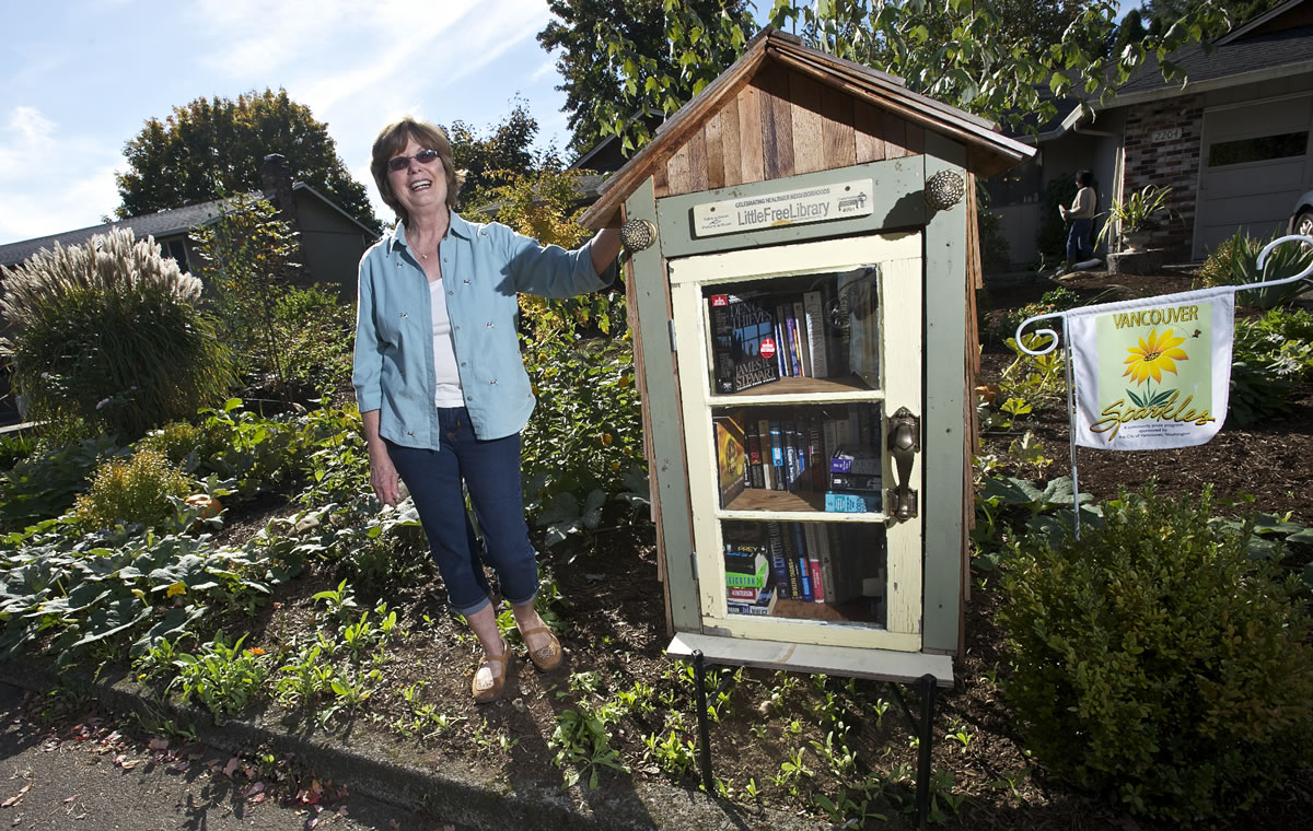 Carla Schreiber and her husband Bob Whitt installed a &quot;Little Free Library&quot; outside their east Vancouver home earlier this year.