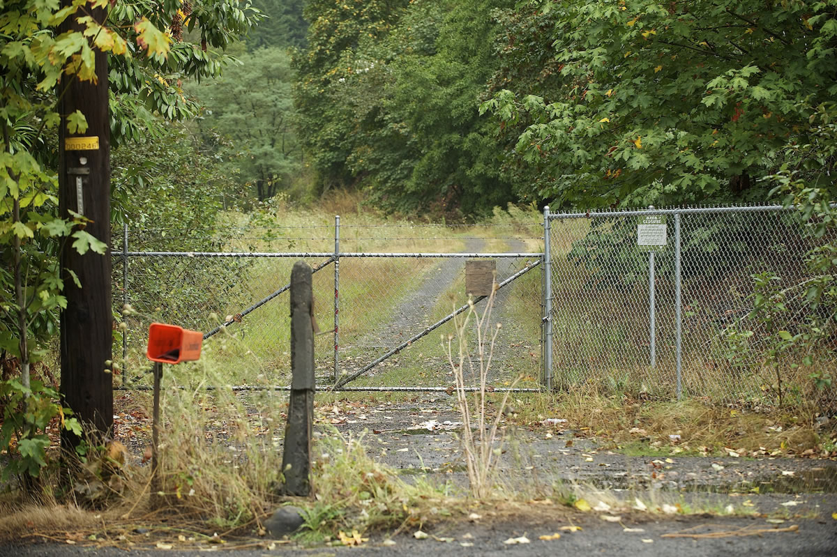 The gated driveway where Michael Livingston was found Friday morning.