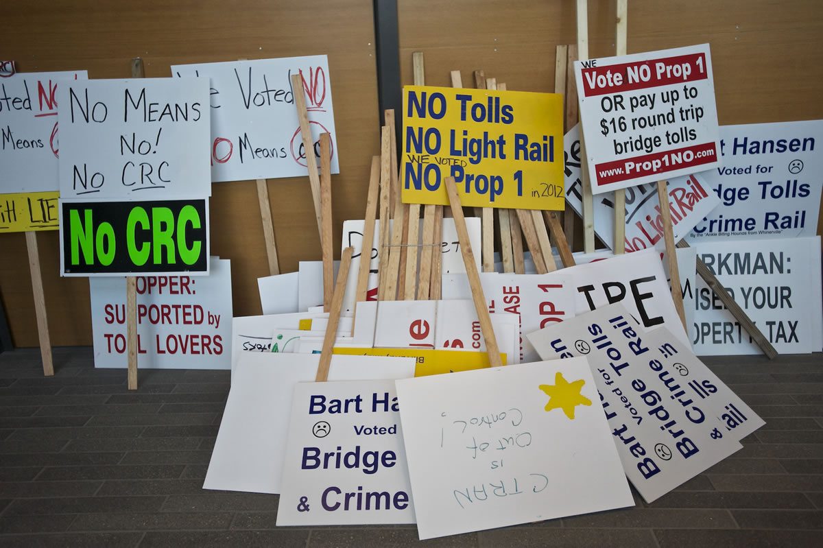 Protest signs sit outside a C-Tran meeting on Tuesday October 8, 2013.