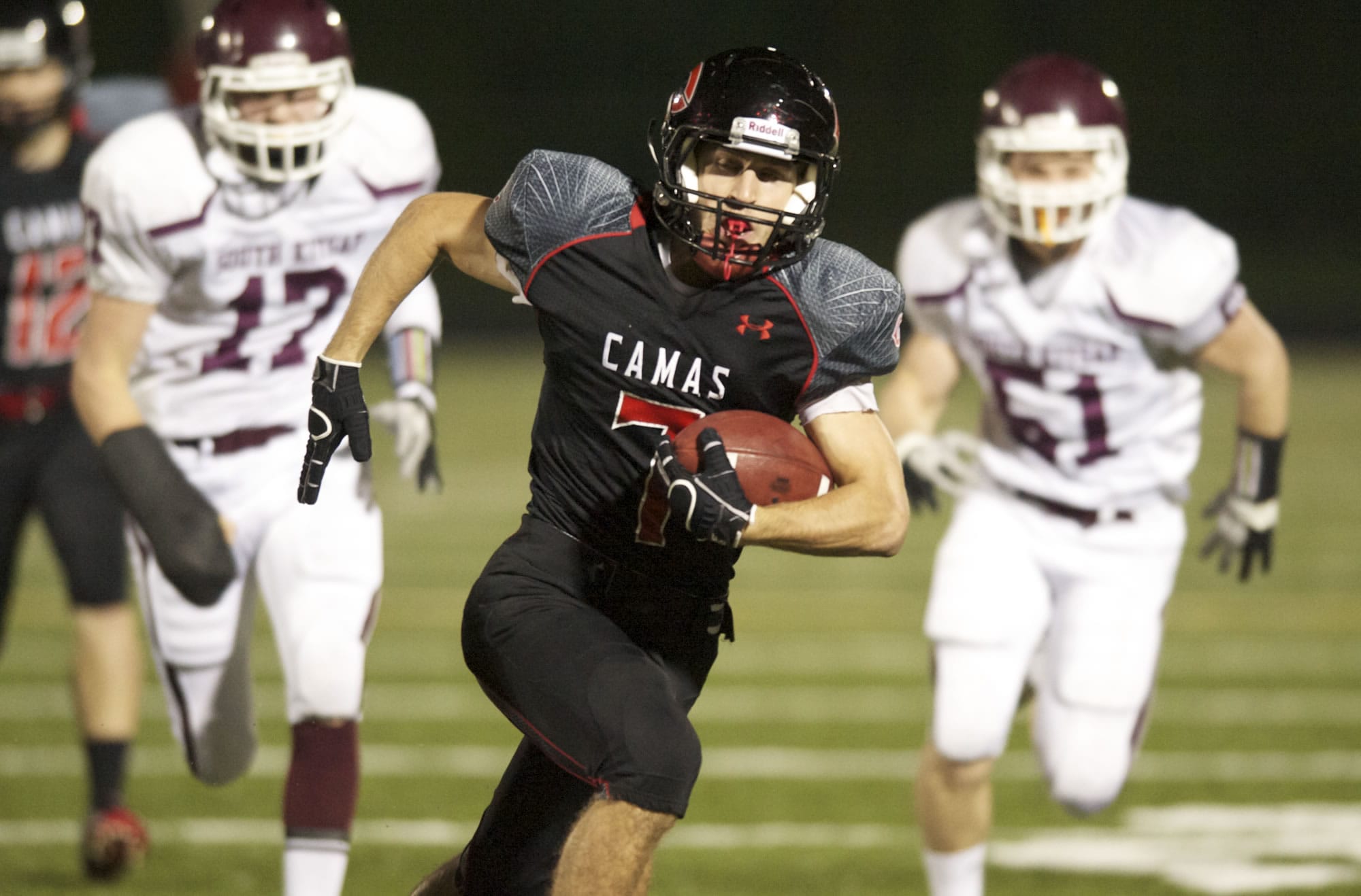Camas' Nate Beasley runs the ball for a touchdown against South Kitsap on Friday.