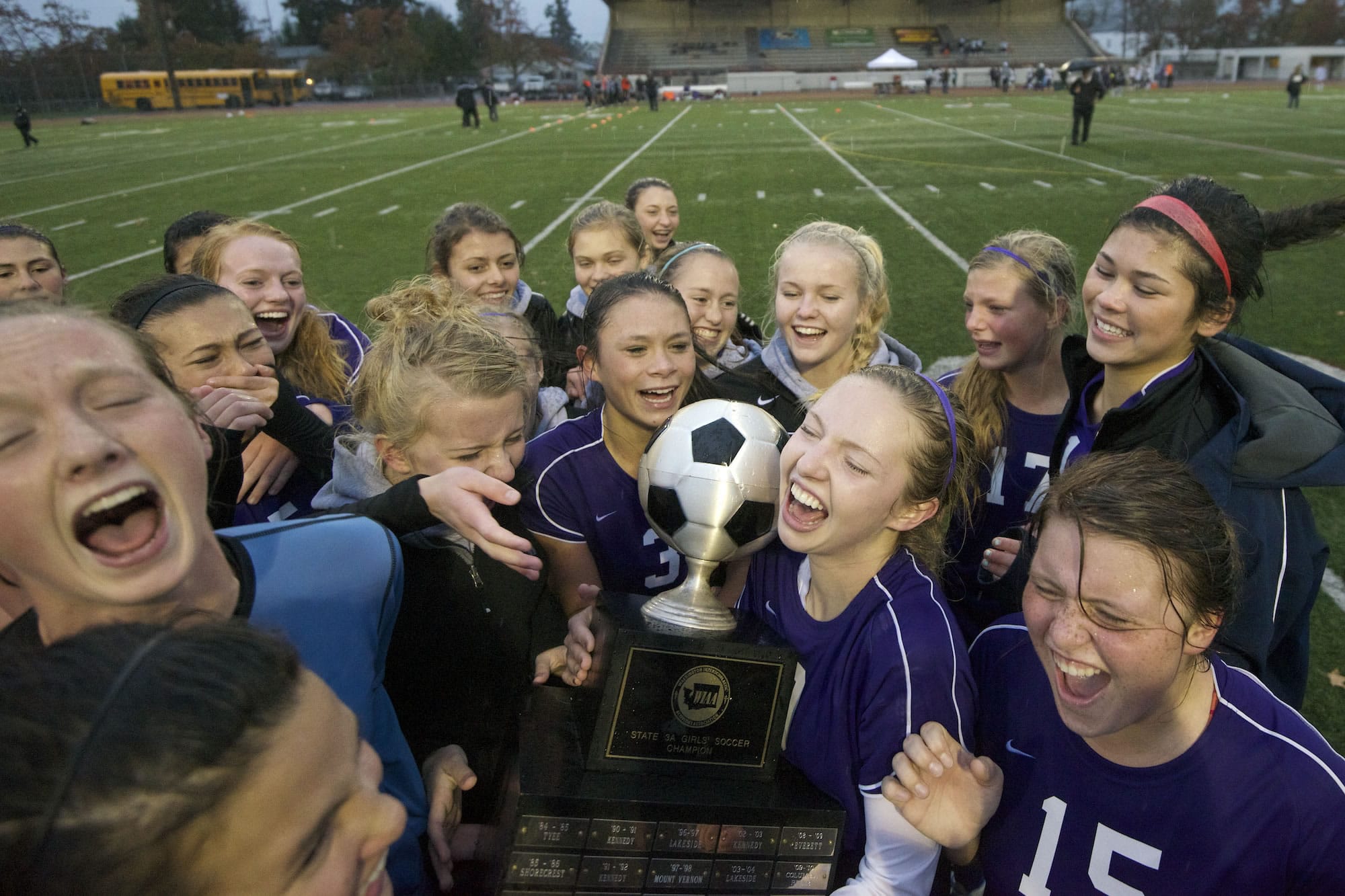 Columbia River players celebrate their 3A state soccer championship after defeating Mount Spokane 2-1 on Saturday at Sparks Stadium in Puyallup.